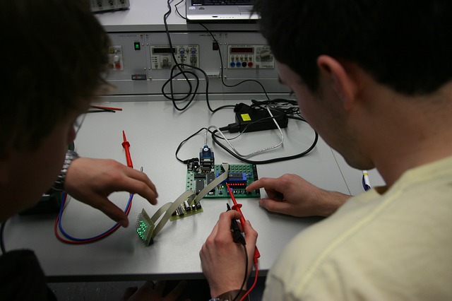 Measuring voltages in computer lab.
